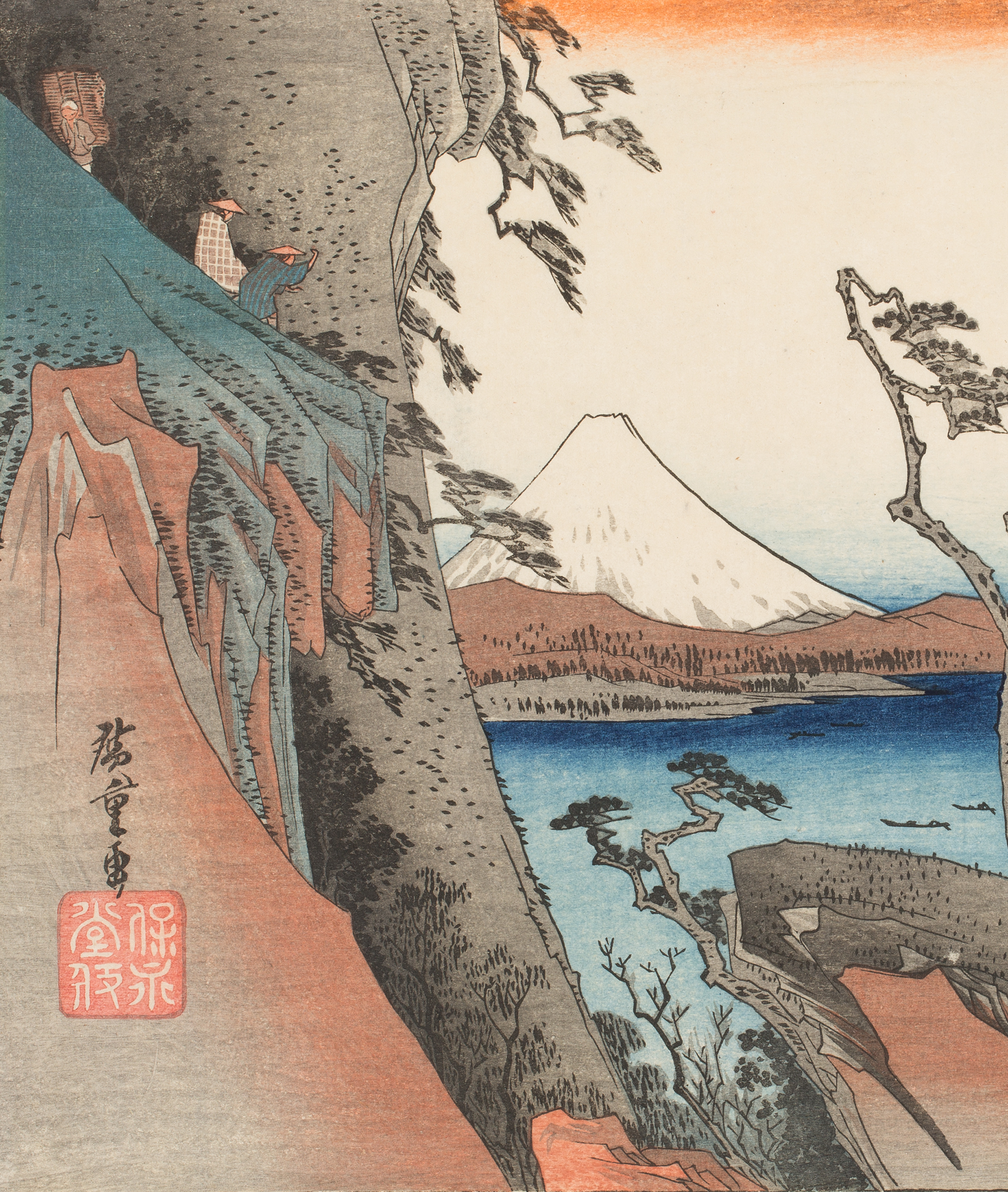 A detail of a Japanese color woodblock print of a white mountain behind trees and a lake